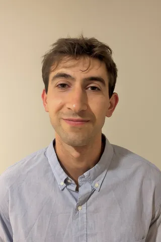 Portrait photo of Isaac Bilsel from the shoulders up.